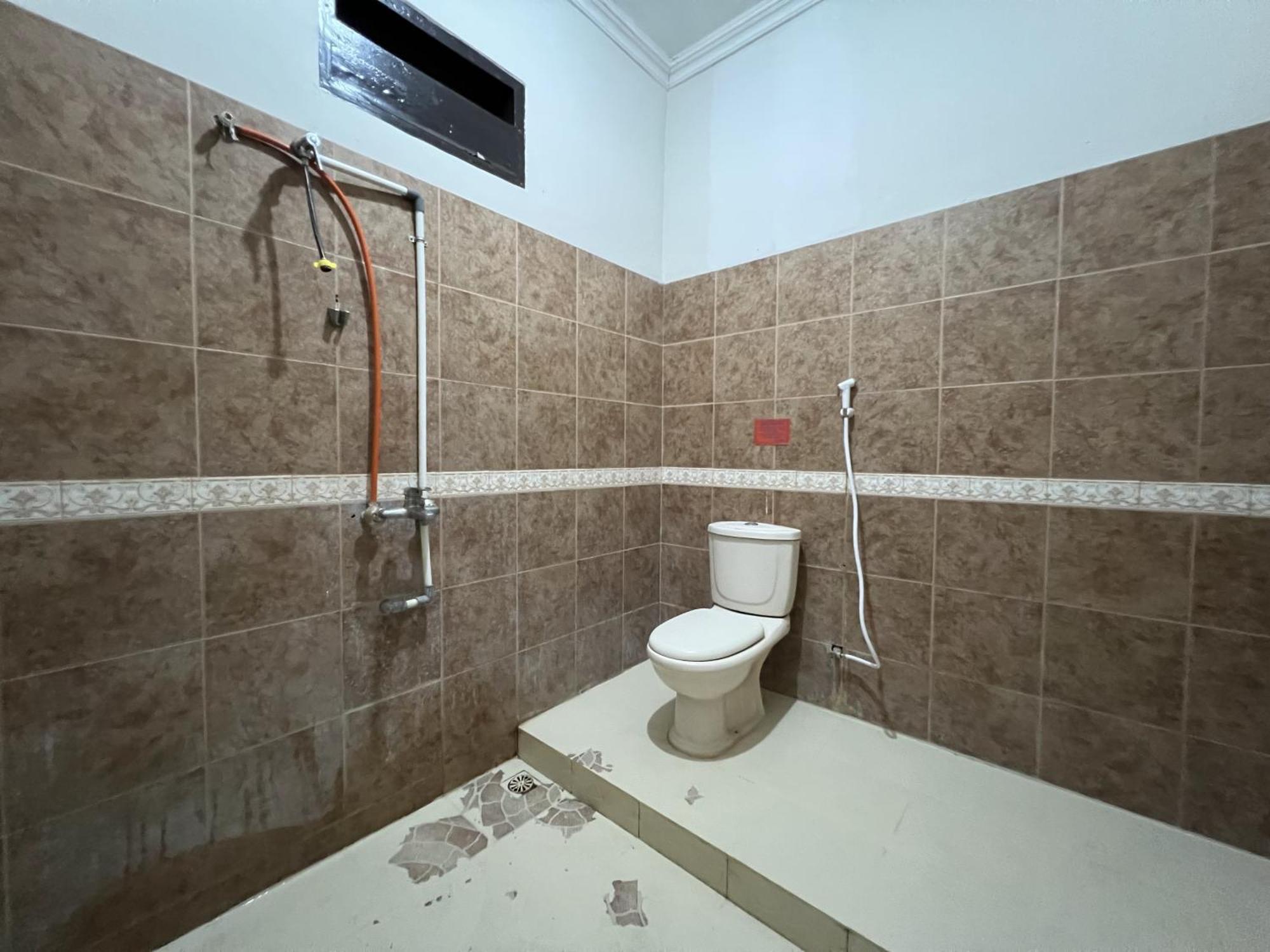 Hotel Oyo 92098 Kost Orange Syariah Makassar Exterior foto